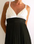 robe mi-longue plisse, noir et blanc satin en location