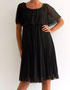 robe noire avec manches a volants en location