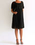 robe noire avec manches a volants en location