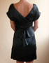 Robe noire mi-longue en soies en location